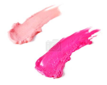 Photo for Smeared, studio and isolated glossy lipstick, makeup and cosmetics on white background. Trendy, bright colour for creative beauty with artistic and texture smudged in beautiful vibrant pink shades. - Royalty Free Image