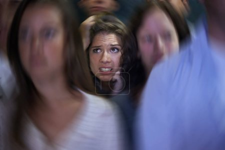 Photo for Woman, crowd and social anxiety in stress with fear, worried and panic with nervous, overthinking and phobia. Trapped, female person and scared as introvert in conference with people and insecure. - Royalty Free Image