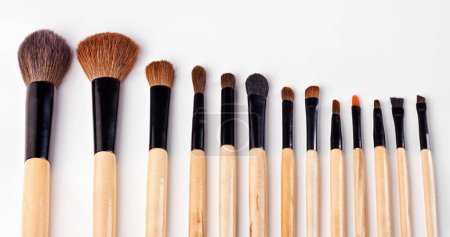 Photo for Brush, collection and tools for makeup, beauty and cosmetics isolated on white background for creative career. Abstract, product and set of accessories for art, powder and skin care in studio. - Royalty Free Image