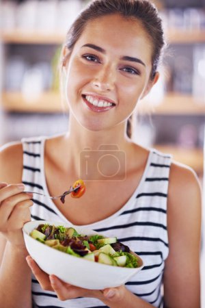 Photo for Morning, woman and portrait in home with salad or healthy snack for nutrition, fiber and protein for day. Female person and daily routine for balanced diet, vegan and organic food with closeup - Royalty Free Image