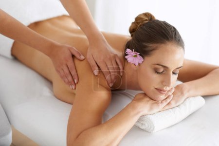 Photo for Relax, massage and woman at hotel spa for health, wellness and zen balance with luxury holistic treatment. Self care, peace and girl on table for muscle therapy, comfort and calm body pamper service. - Royalty Free Image