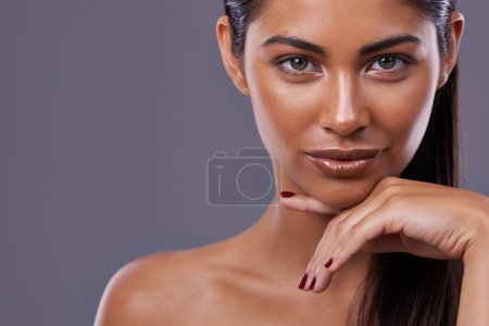Photo for Portrait, beauty and woman with skincare, cosmetics and dermatology on a grey studio background. Face, person and model with wellness and healthy skin with makeup and shine with glow and mockup space. - Royalty Free Image