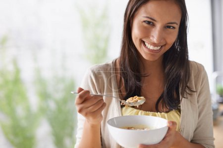 Photo for Happy woman, portrait and bowl with cereal for breakfast, natural nutrition or healthy oatmeal at home. Face of young female person with smile and porridge for vitamin diet, fiber or calcium at house. - Royalty Free Image