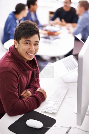 Photo for Happy, portrait and asian man with computer for creative startup, research or development at the office. Face of male person with smile for technology, digital career or tech company at the workplace. - Royalty Free Image