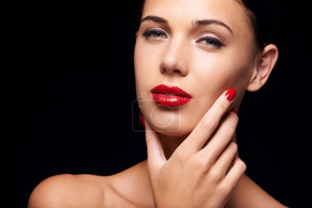 Photo for Cosmetics, manicure and portrait of woman in studio with trendy, beauty and face routine with red lips. Makeup, nail polish and female model with facial cosmetology treatment by black background - Royalty Free Image