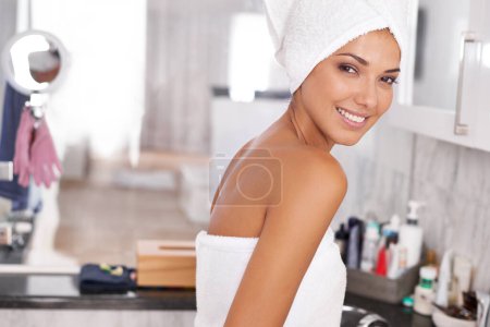 Photo for Portrait, shower and towel with woman in bathroom of home for body care, cleaning or hydration routine. Beauty, skincare and wellness with face of young woman in apartment for morning grooming. - Royalty Free Image