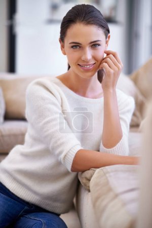Photo for Portrait, relax and happy woman with confidence in living room on sofa for casual weekend in USA. Comfort, pride and girl on floor in home with smile, calm and carefree positive attitude for wellness. - Royalty Free Image