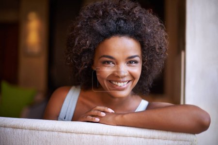Photo for Smile, sofa and portrait of woman in living room for weekend rest, break or afternoon free time. Relax, happy and face of black female person on couch with positive mood, satisfaction and enjoyment. - Royalty Free Image