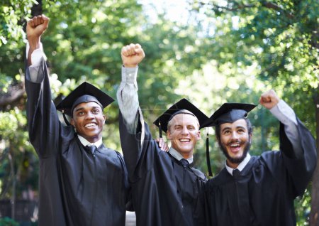 Photo for Excited, students and portrait at graduation with fist, success and celebration of men outdoor with a smile. Fist pump, yes and education event on campus with diversity and college degree achievement. - Royalty Free Image
