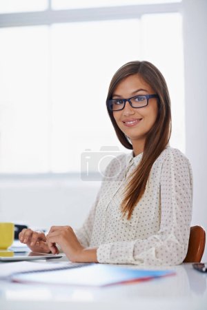 Photo for Professional, portrait and happy woman with tablet at desk in office or creative web developer. Website, designer or person with research on internet for development of company erp, software and site. - Royalty Free Image