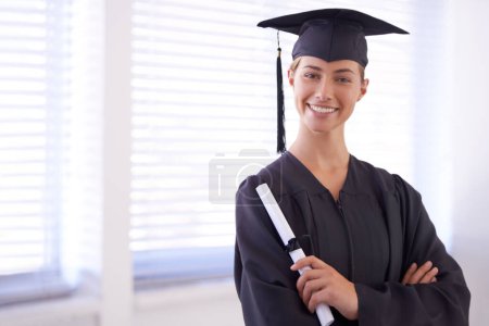 Photo for Graduate, diploma and portrait of happy woman with arms crossed at university. Face, graduation and confident student with certificate for education achievement, success and scholarship in Canada. - Royalty Free Image