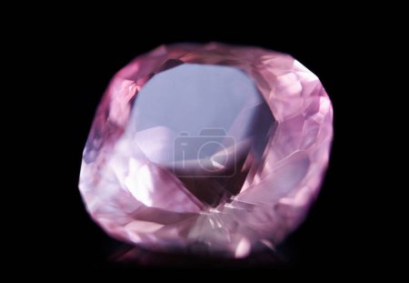 Photo for Pink diamond, jewel and stone by black background for natural resource, sparkle and luxury. Rocks, mineral and crystal in closeup for gem with shine, glow and brilliant cut with reflection in studio. - Royalty Free Image