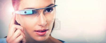 Photo for Woman, futuristic and press glasses for augmented reality, metaverse or internet. Face, cyber eyewear or smart tech for online vision of serious person in studio isolated on a background mockup space. - Royalty Free Image