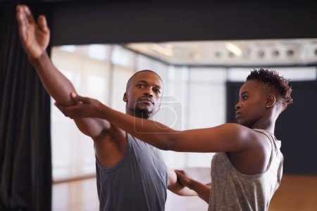 Photo for Art, creative or dance with student and teacher in class together for theater performance training. Fitness, learning and school with black man instructor teaching dancer in studio for production. - Royalty Free Image