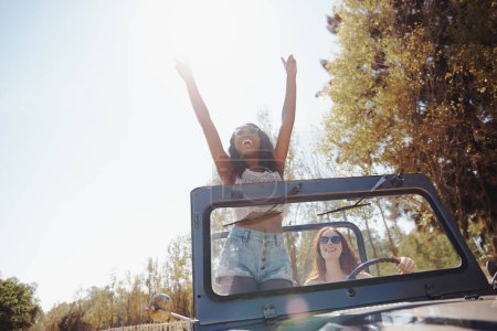 Photo for Happy women, excited and travel on road trip in nature and bonding together for adventure on holiday. Friends, driving and journey in convertible van on vacation, countryside and outdoor fun in texas. - Royalty Free Image