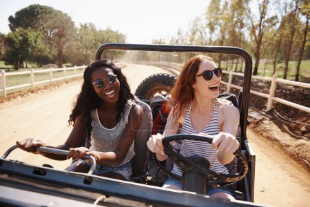 Photo for Happy women, laughing and vacation with road trip in nature and funny joke for adventure in outdoor. Friends, driving or journey in convertible van on holiday, countryside or bonding together by farm. - Royalty Free Image