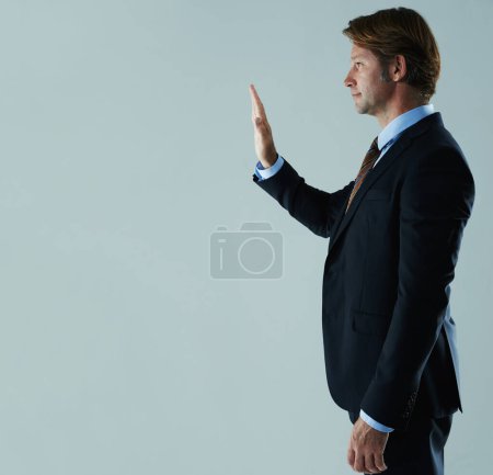 Photo for Business man, suit and hand for wave, stop or gesture for symbol or interaction in corporate or company. Young person, executive or professional with arm up for signal, direct or touch on mockup. - Royalty Free Image