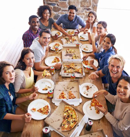 Photo for Group, friends and party with pizza, diversity and high angle for joy or celebration for youth. Men, women and fast food with drink, social gathering and snack for lunch or eating at italian pizzeria. - Royalty Free Image