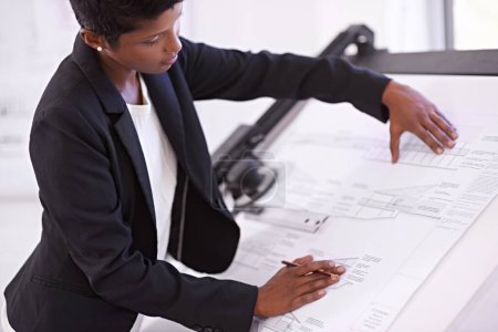 Photo for Architect, civil engineering or black woman drawing on blueprint or paper model for development project. Measure, creative or female designer with ruler for sketching floor plan of office building. - Royalty Free Image