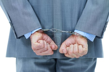 Photo for Businessman, hands and cuffs with crime for theft or corruption on a white studio background. Closeup of man or employee back tied up with chain for arrest, criminal or illegal bribery of the law. - Royalty Free Image