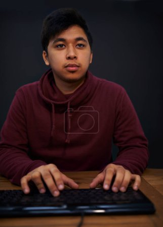 Photo for Asian man, face and keyboard for coding, programmer and information technology with video game or software development. Internet, computer programming with gamer or developer for cyber security. - Royalty Free Image