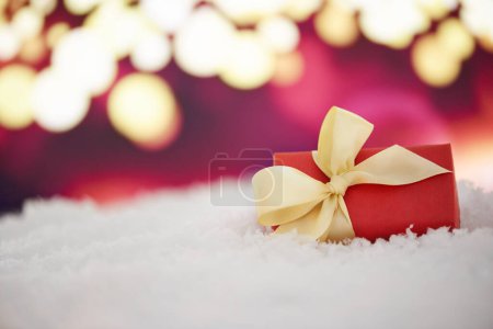 Photo for Box, ribbon and gift for Christmas in home, present and red package for festive season. Closeup, religious holiday and wrapping paper for celebration on vacation, decor and tradition for birthday. - Royalty Free Image