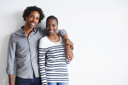 Photo for Couple, happiness and portrait by white wall with hug for romance, support and healthy relationship with mockup. Black woman, and face of man with embrace for trust, comfort and affection with relax. - Royalty Free Image