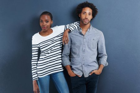 Photo for Fashion, portrait and cool black couple in studio with love and support on gray background together with pride. African, people and casual clothes or confident in style on date with wall mockup space. - Royalty Free Image