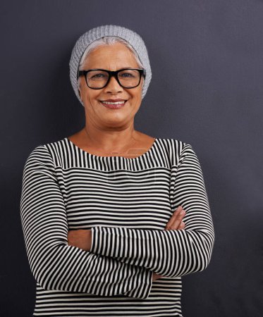 Photo for Portrait, old woman and fashion with glasses, arms crossed and happiness on dark studio background. Face, old person and model with confidence and eyewear with clear vision, hipster or stylish outfit. - Royalty Free Image