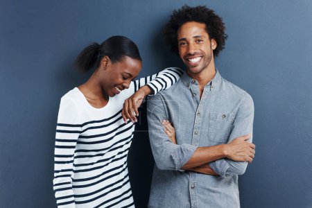 Photo for Fashion, portrait and happy black couple in studio with love and support on gray background together with happiness. African, people and casual clothes or style on date with wall mockup space. - Royalty Free Image
