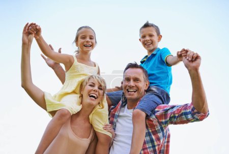 Photo for Portrait, parents and carrying children in park, shoulders and quality time in nature. Love, smile and joyful with happy mother and father on holiday relax, spring or carefree with family on vacation. - Royalty Free Image