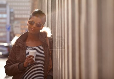 Photo for Street, fashion and portrait of woman with coffee, outdoor and happy, sunglasses and city. Adult, female person and girl with smile with jacket or coat in Cape Town, shades and tea to drink on hand. - Royalty Free Image