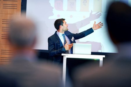 Photo for Business man, presentation and pointing at projector screen, conference or workshop with laptop for slideshow. Corporate training, seminar and speaker with info, audience and professional speech. - Royalty Free Image
