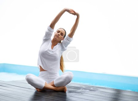 Photo for Yoga, stretching and woman with exercise outdoor for spiritual, mental and body wellness on patio. Balance, meditation and female person with warm up for pilates workout for peace, calm and zen - Royalty Free Image
