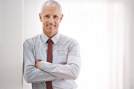 Photo for Portrait, senior man and professional with arms crossed, mockup space or agent in workplace. Face, mature person or entrepreneur with confidence or employee with startup or corporate with business. - Royalty Free Image