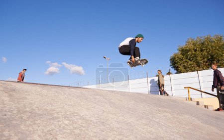 Photo for Skateboard, energy and man with ramp, training and people with competition and challenge with performance. Adventure, jump or skater with practice for technique and cardio with balance or sunshine. - Royalty Free Image