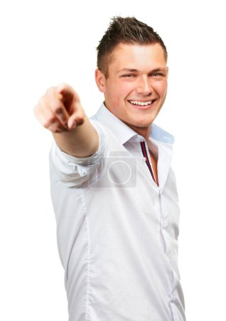 Photo for Happy man, portrait and pointing to you for decision, choice or pick on a white studio background. Isolated, handsome male person or young model with smile for choose or selection in stylish clothing. - Royalty Free Image