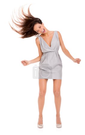 Photo for Woman, dancing and crazy hair with music, work fashion and freedom with celebration in a studio. Happy, smile and career achievement with a female person in trendy clothes with white background. - Royalty Free Image