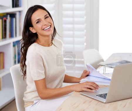 Photo for Paperwork, smile and portrait of woman with laptop working on creative project at home office. Happy, technology and female freelance designer with documents and computer in workspace at apartment - Royalty Free Image
