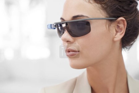 Photo for Augmented reality, face and businesswoman with smart glasses, internet connection and mockup in office. Future technology, workplace and happy girl with designer VR sunglasses, vision and electronics. - Royalty Free Image
