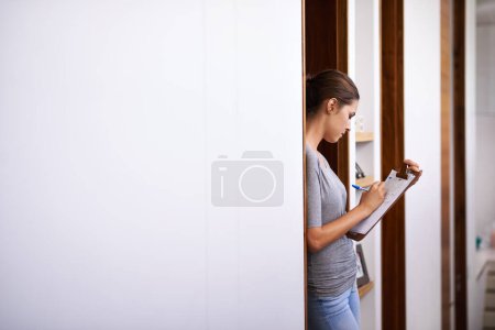 Photo for Home, woman and writing with clipboard for checklist with pen for notes and organize paperwork. Housewife, mockup and invoice with document for information with schedule, costs and grocery payment. - Royalty Free Image