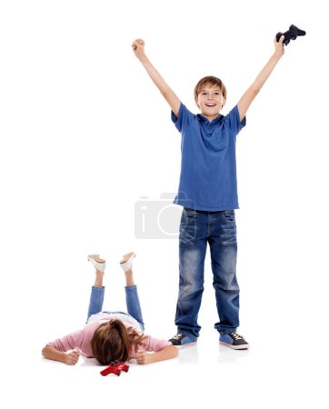 Photo for Happy, sad and children with video games on a white background for playing, celebration and winning. Family, siblings and upset girl with excited boy with remote controller for gaming in studio. - Royalty Free Image