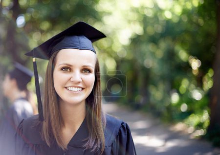 Photo for Graduate, portrait and graduation with woman outdoor at university, college and achievement ceremony. Education, campus and happy at certificate, degree and school event with a smile from diploma. - Royalty Free Image