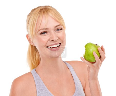 Photo for Portrait, studio and happy woman with apple for diet, benefits or food to lose weight. Healthy eating, nutrition and face of girl with fruit for body wellness, digestion and smile on white background. - Royalty Free Image