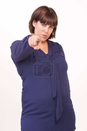 Photo for Portrait, fashion and pointing at you with woman in studio isolated on white background for decision. Emoji, hand and vote with confident plus size model choosing option for selection in style outfit. - Royalty Free Image