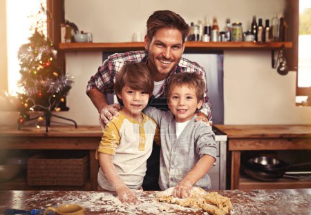 Photo for Father, portrait and happy children baking at Christmas, learning or bonding together in home. Face, kids and dad cooking at xmas on holiday with flour for teaching brothers with family in kitchen. - Royalty Free Image