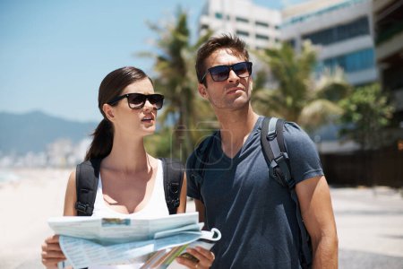 Photo for Couple, map and search with journey on vacation, street and excited for giving direction. Woman, man and chart for location, landmark and travel for memory with buildings, beach or thinking in Italy. - Royalty Free Image