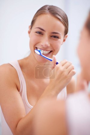 Photo for Portrait, smile and toothbrush for oral hygiene care with woman in bathroom of home for teeth whitening. Face, dental care and happy young person in apartment to prevent tooth decay or gum disease. - Royalty Free Image
