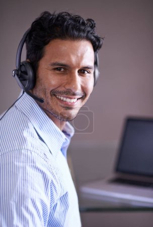 Photo for Man, call center and portrait with contact us and smile for tech support, help desk and communication with headset. Customer service consultant, CRM and telecom with mic for telemarketing sales. - Royalty Free Image