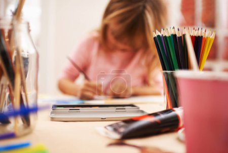 Photo for Little girl, drawing and writing with pencil for art, craft or color in learning creativity or education at home. Young child sketching for artwork with creative imagination in childhood development. - Royalty Free Image